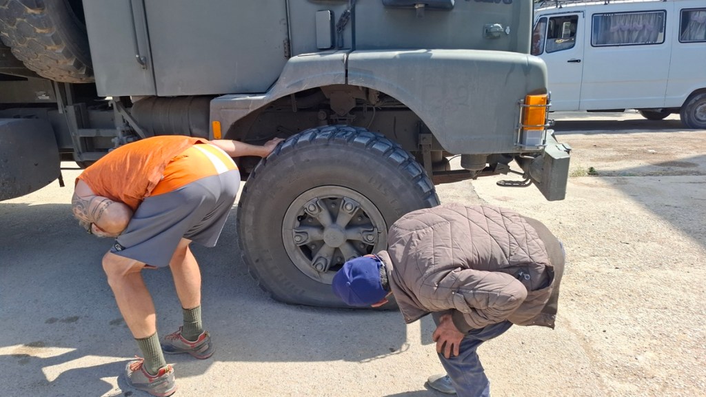 Jacqueline Lambert's truck The Beast with a flat tyre on the way to the ferry, Morocco
